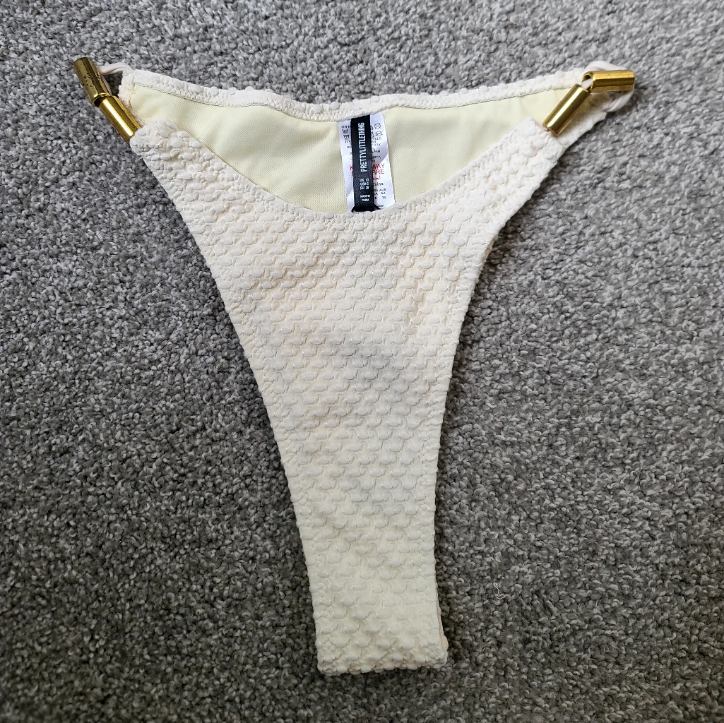 Cream Textured Bikini Bottom With Gold Accents